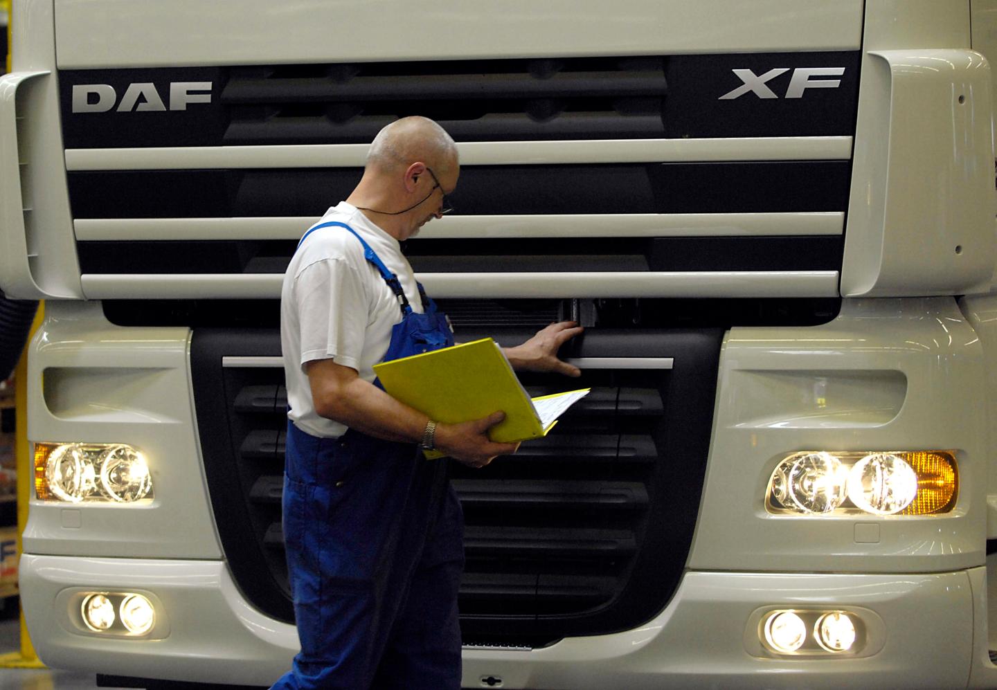 A worker monitors production at the DAF Trucks NV factory in