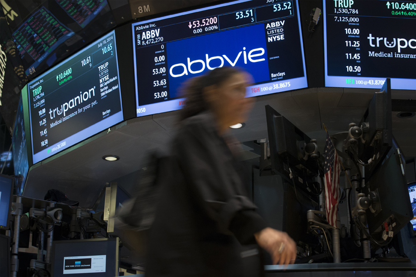 A screen displays the share price for pharmaceutical maker AbbVie on the floor of the New York Stock Exchange
