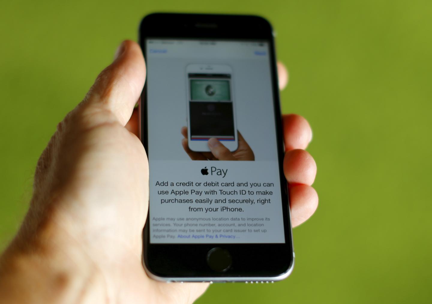 An Apple iphone 6 with Apple Pay is shown in this photo illustration in Encinitas , California