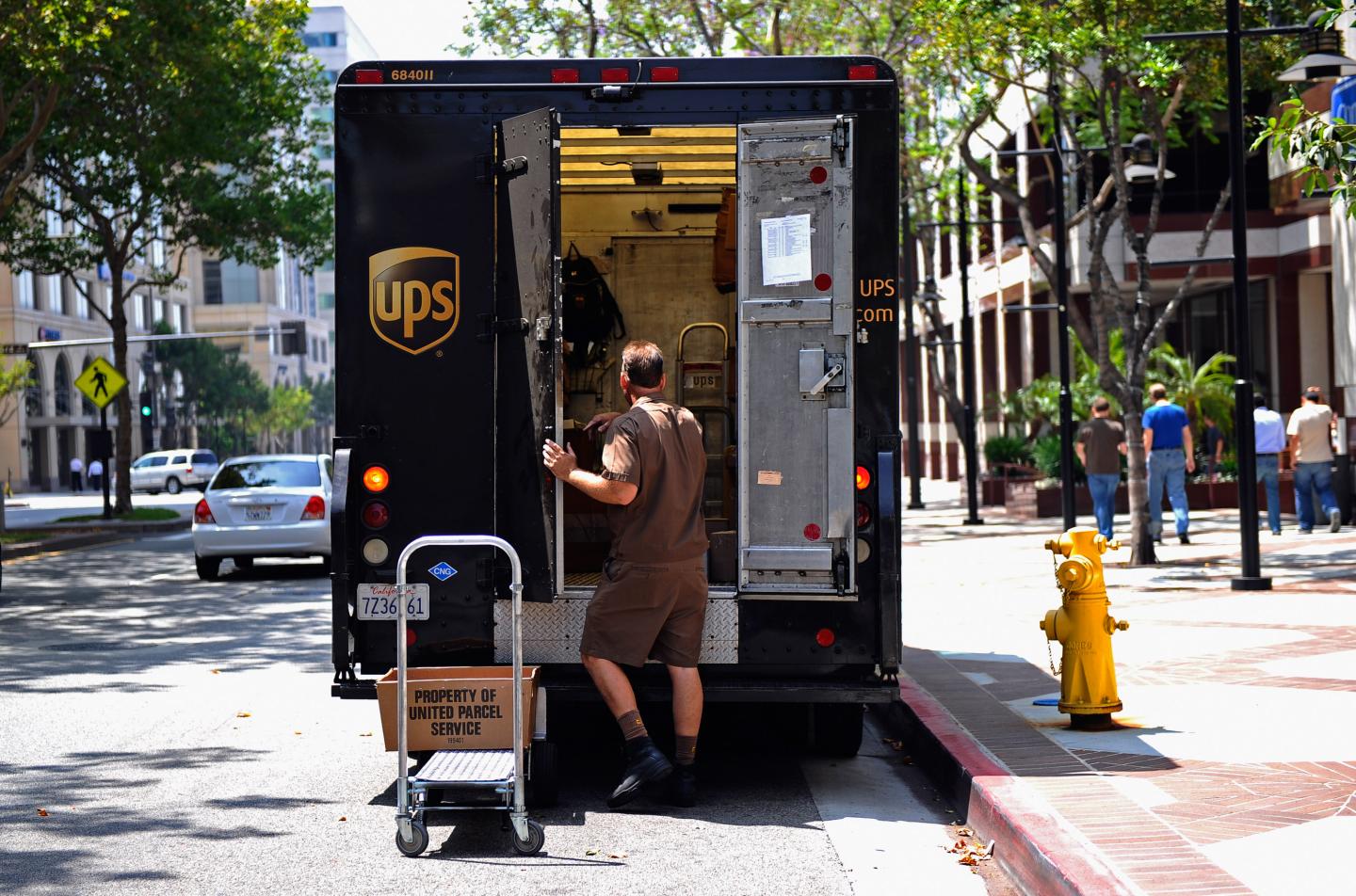 UPS's Income Rises 90 Percent
