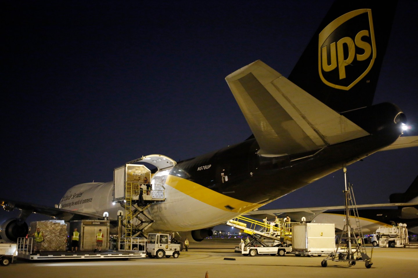 A Boeing-747 is unloaded by ground crews during United Parcel Service Inc. (UPS) Worldport overnight shipping operations at Louisville International Airport in Louisville, Kentucky.