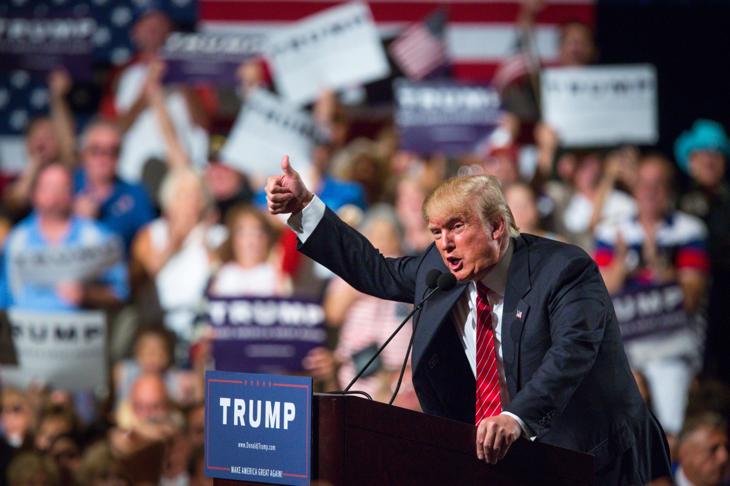Caption:PHOENIX, AZ - JULY 11: Republican Presidential candidate Donald Trump addresses supporters during a political rally at the Phoenix Convention Center on July 11, 2015 in Phoenix, Arizona. Trump spoke about illegal immigration and other topics in front of an estimated crowd of 4,200. (Photo by Charlie Leight/Getty Images)