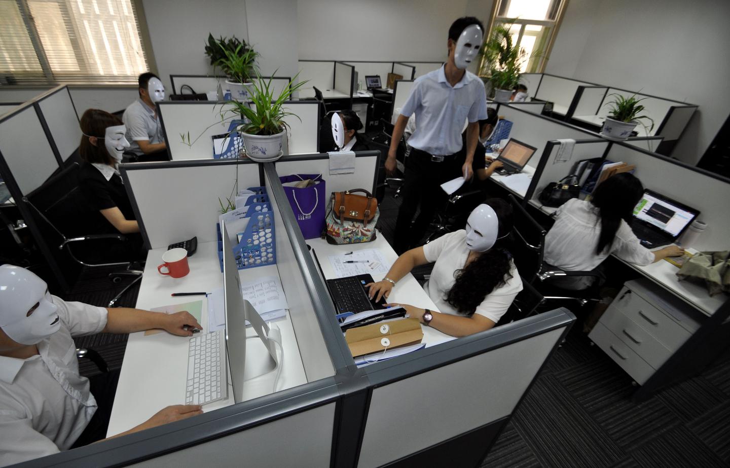 Staffs Wear No-Face Masks To Reduce Pressure During Working Time In Handan