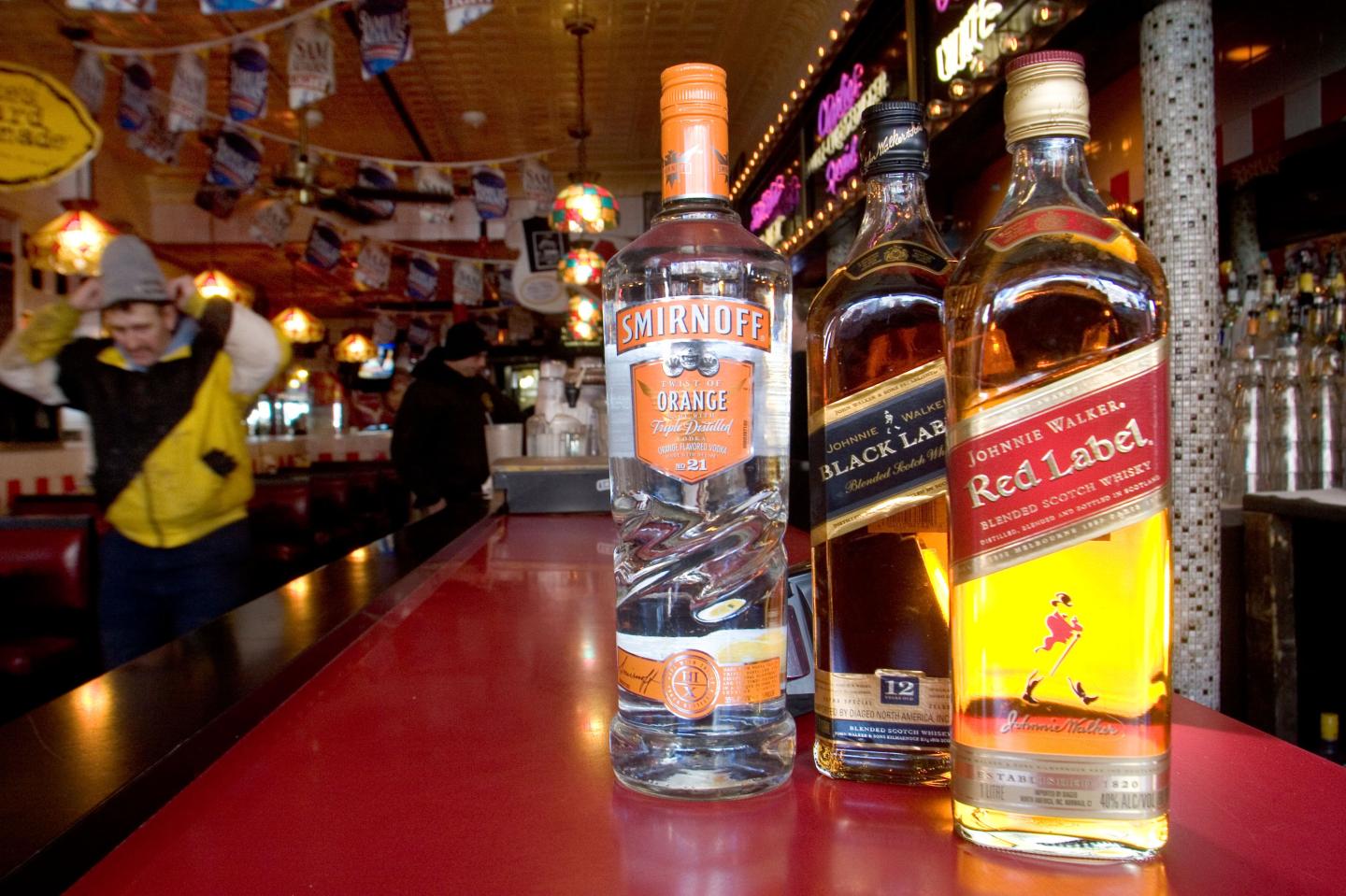 Bottles of Johnnie Walker Scotch whisky and Smirnoff Vodka a