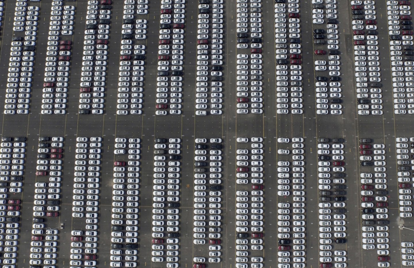 An aerial picture shows new Chevrolet cars at a General Motors' parking lot in Shenyang