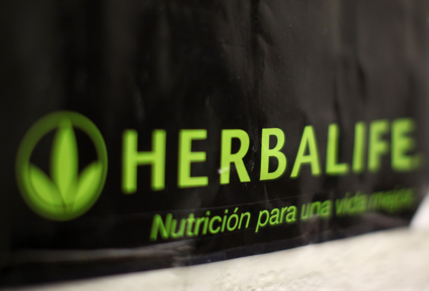 An Herbalife logo is shown on a poster at a clinic in the Mission District in San Francisco