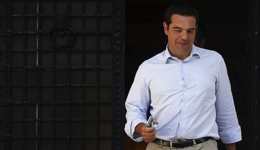 Greek Prime Minister Alexis Tsipras leaves his office at Maximos Mansion in Athens Thursday.