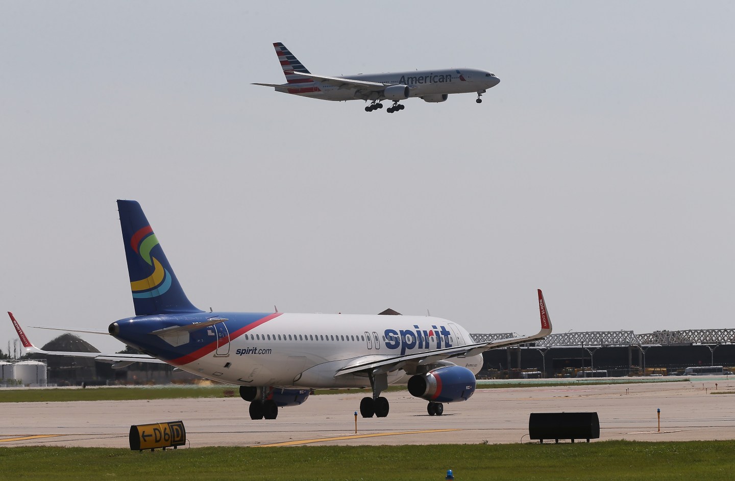 A Spirit Airlines jet taxis at O'Hare International Airport on September 19, 2014 in Chicago, Illinois.