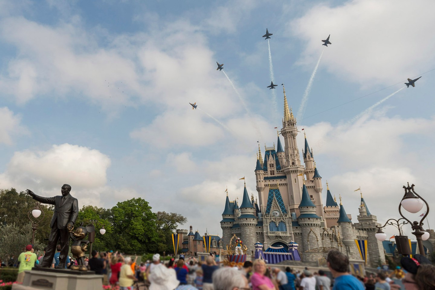 U.S. Navy Blue Angels Soar Above Cinderella Castle At Walt Disney World Resort