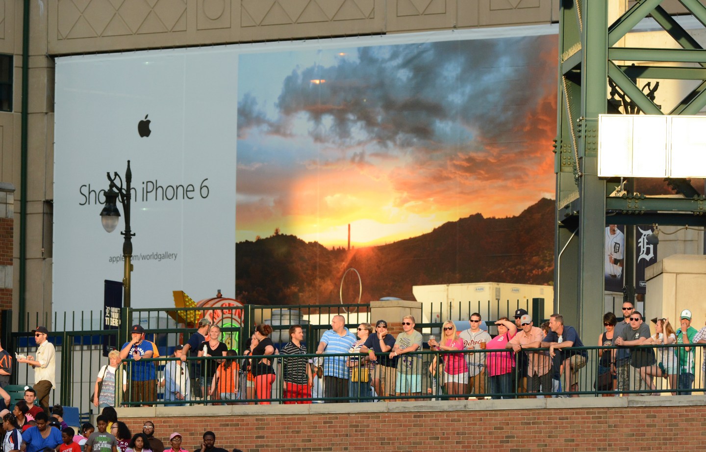 A general view of Comerica Park with an Apple iPhone 6 advertisment in the background as fans watch the game between the Detroit Tigers and the Cincinnati Reds at Comerica Park on June 16, 2015 in Detroit, Michigan.