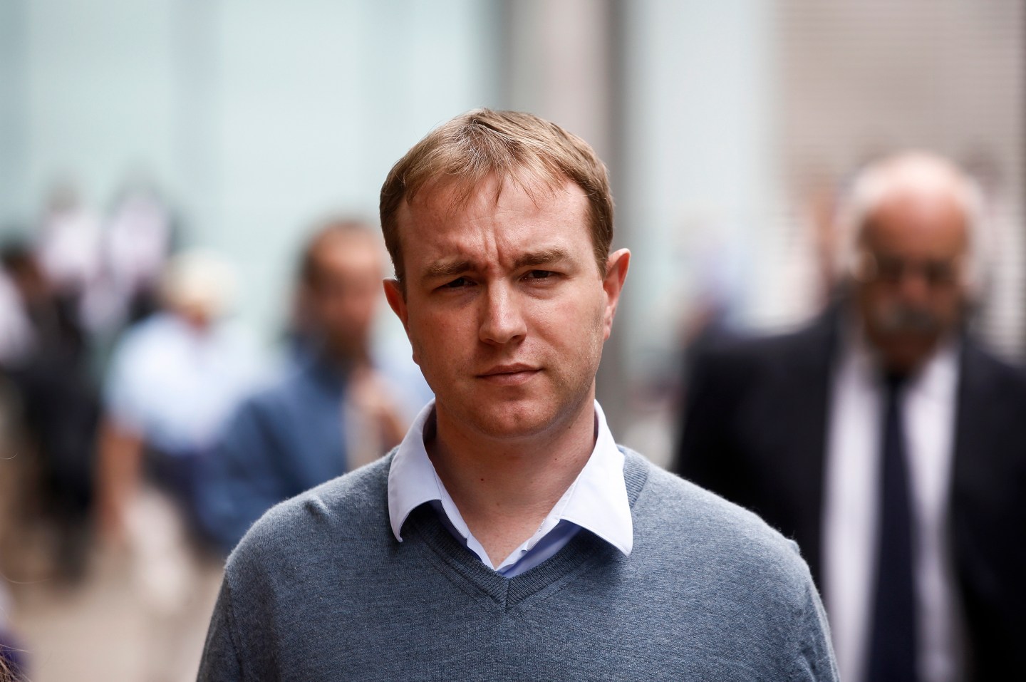 Thomas 'Tom' Hayes, a former trader at banks including UBS Group AG and Citigroup Inc., leaves for lunch during for his trial at Southwark Crown Court in London, U.K., on Monday, Aug. 03, 2015. Hayes, the first person to stand trial for manipulating Libor, was found guilty of eight counts of conspiracy to rig the benchmark rate. Photographer: Simon Dawson/Bloomberg *** Local Caption *** Tom Hayes