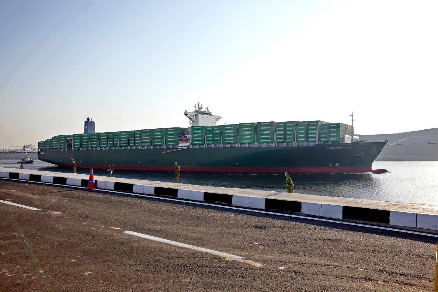 A container ship passes through the New Suez Canal during the official opening ceremony in Ismailia, Egypt, on Aug. 6.
