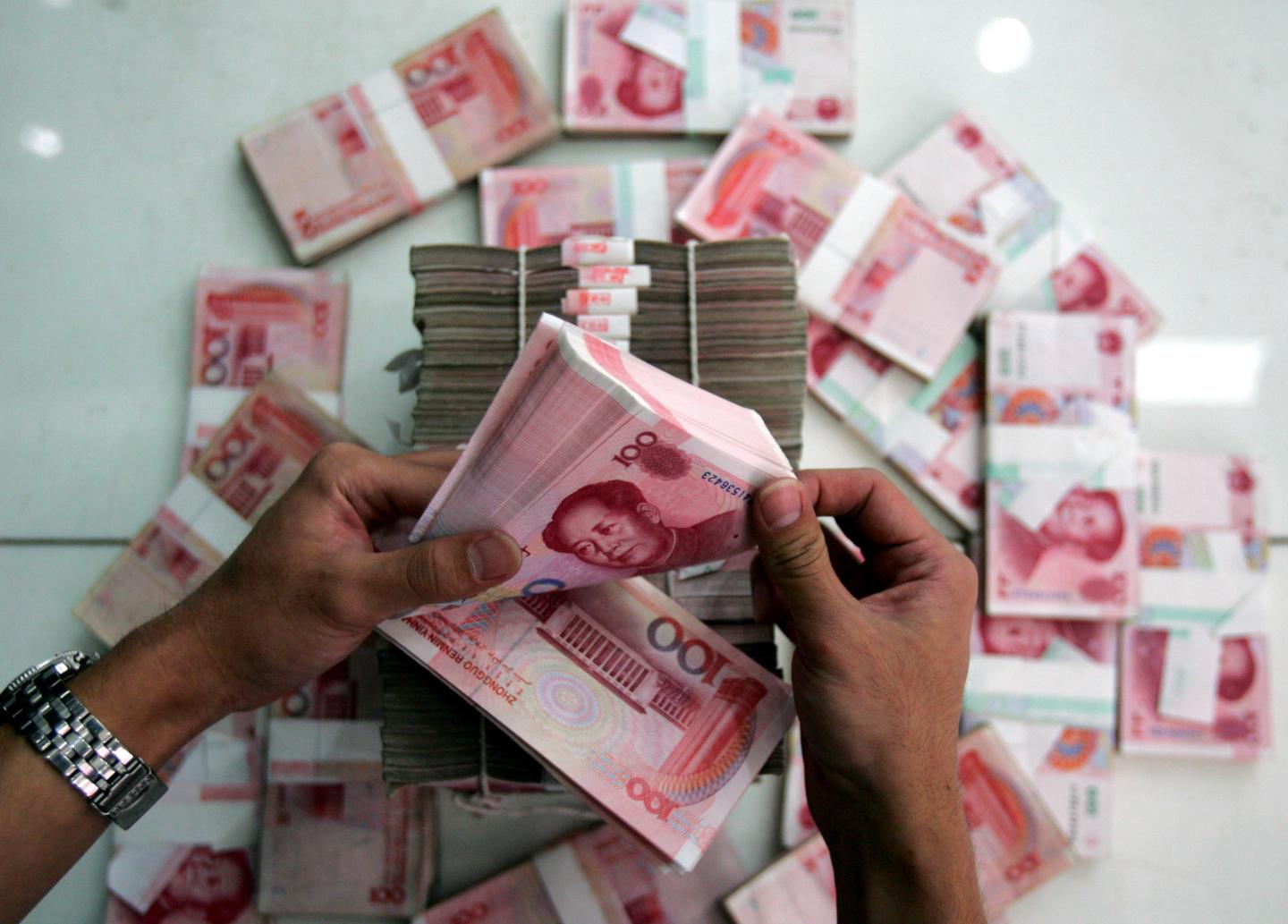 China Scraps Yuan Peg To US dollar