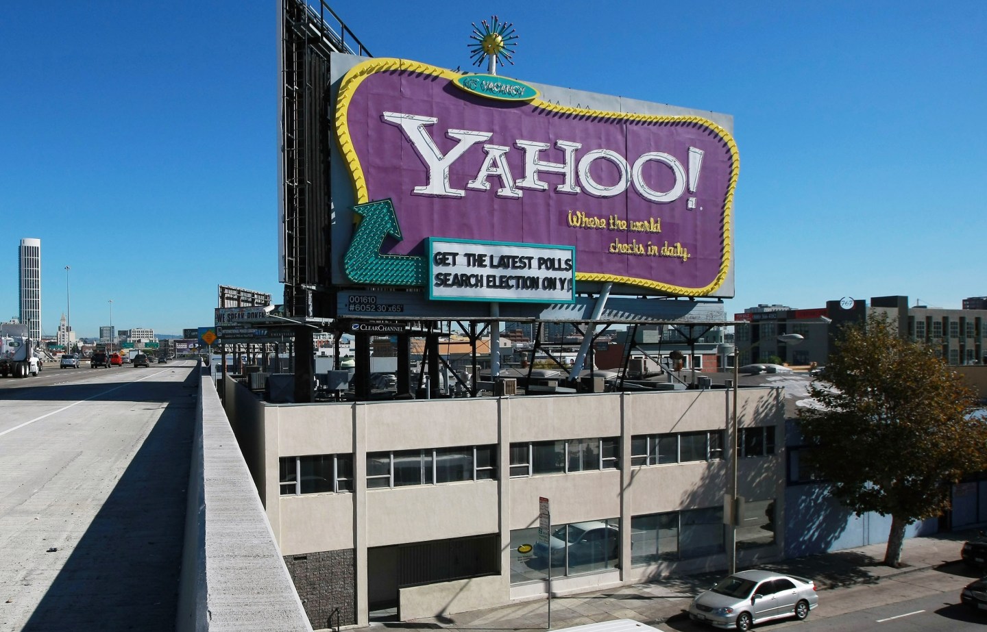 Cars drive by the landmark Yahoo billboard on October 21, 2008, in San Francisco, California.
