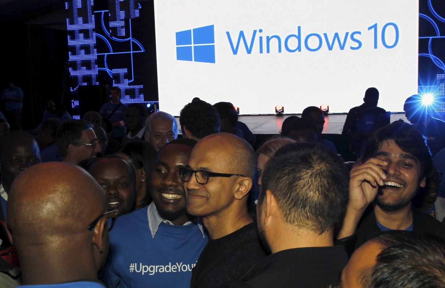 Nadella takes photographs with delegates after the launch of the Windows 10 operating system in Kenya's capital Nairobi