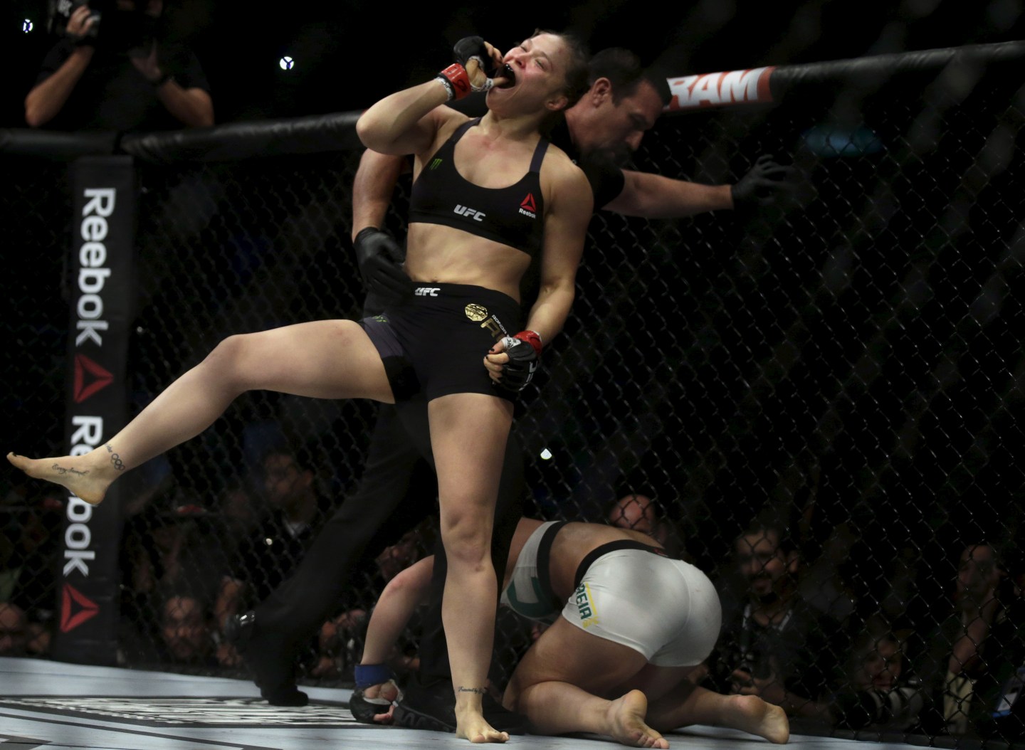 Rousey of U.S celebrates after defeating Correia of Brazil during their UFC match in Rio de Janeiro