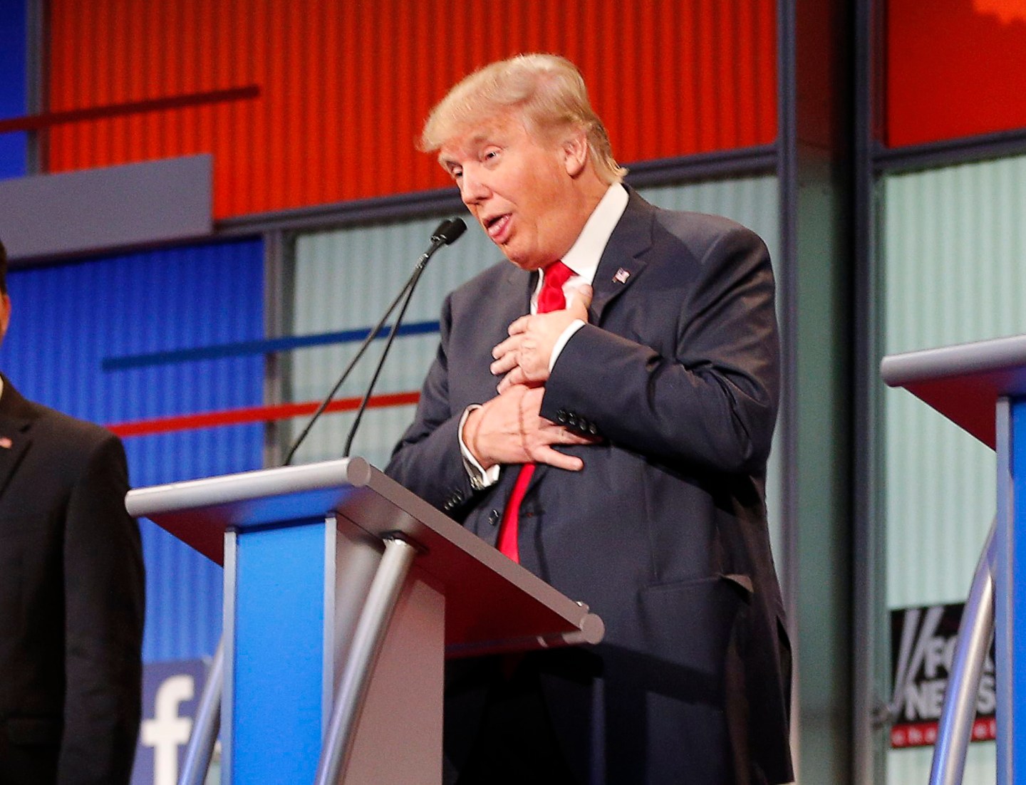 Republican 2016 U.S. presidential candidate and businessman Donald Trump reacts near the end of the first official Republican presidential candidates debate of the 2016 U.S. presidential campaign in Cleveland