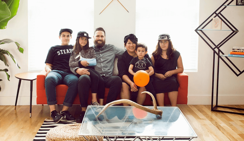 Tran Wills and her family (from left to right): Noah, Elliot, Josh, Tran, Hesh on her lap, and Quynh.