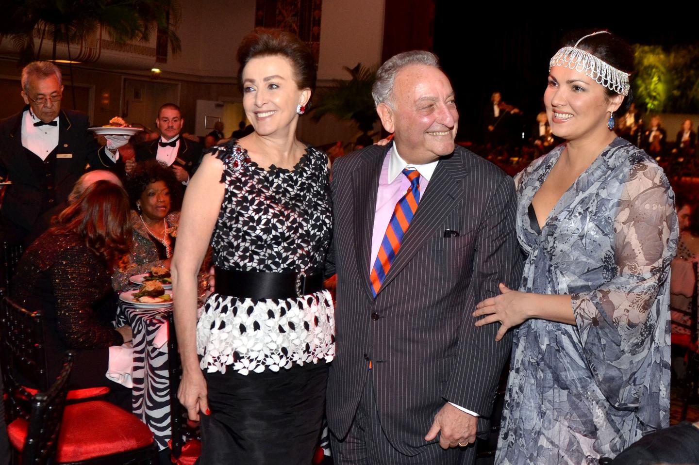 Left to right: Mercedes Bass, vice chair of the board of trustees of Carnegie Hall; Sandy Weill, chairman of Carnegie Hall; and soprano Anna Netrebko attend the Carnegie Hall dinner gala at the Waldorf Astoria in New York on Oct. 2, 2013.