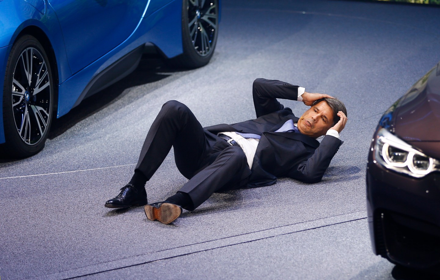 BMW CEO Krueger collapses at a presentation during the media day at the Frankfurt Motor Show (IAA) in Frankfurt