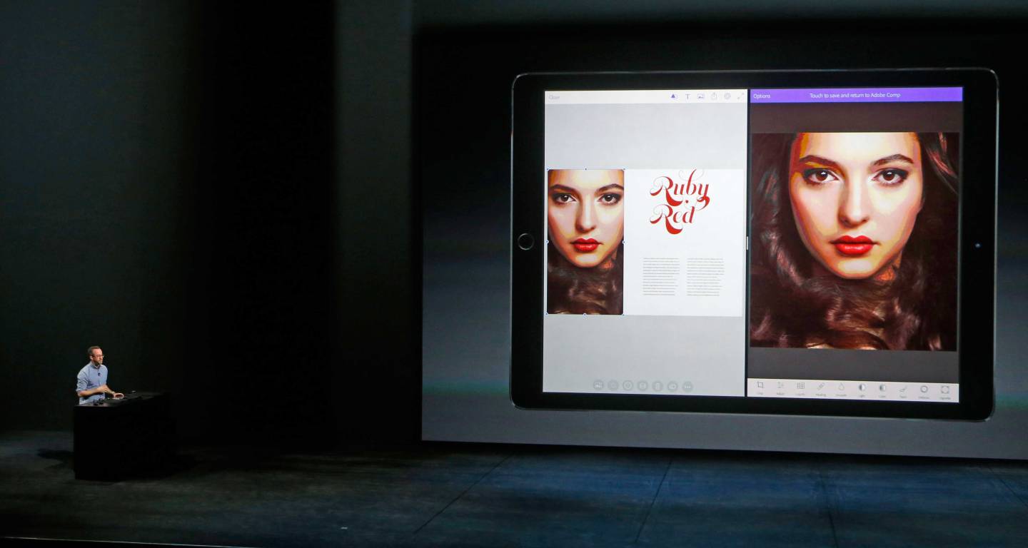 Eric Snowden, Director of Design for Adobe/Behance, displays Adobe software for the new iPad Pro during an Apple media event in San Francisco, California