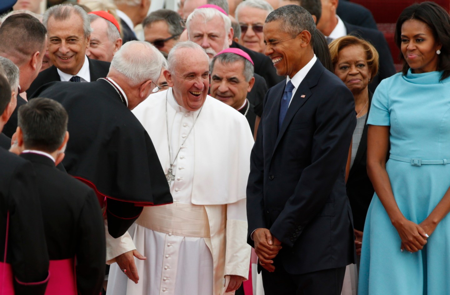 U.S. President Barack Obama and Pope Francis share a laugh as President Obama welcomed the Pontiff upon his arrival at Joint Base Andrews outside Washington