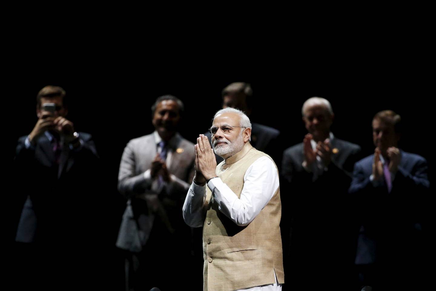Indian PM Modi gestures during a community reception at SAP Center in San Jose, California