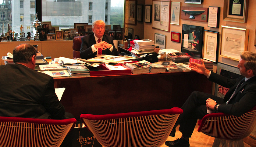 Donald Trump (center) with Jeffrey Sonnenfeld (left) and his Yale colleague Jacob Hacker (right) in Trump's office