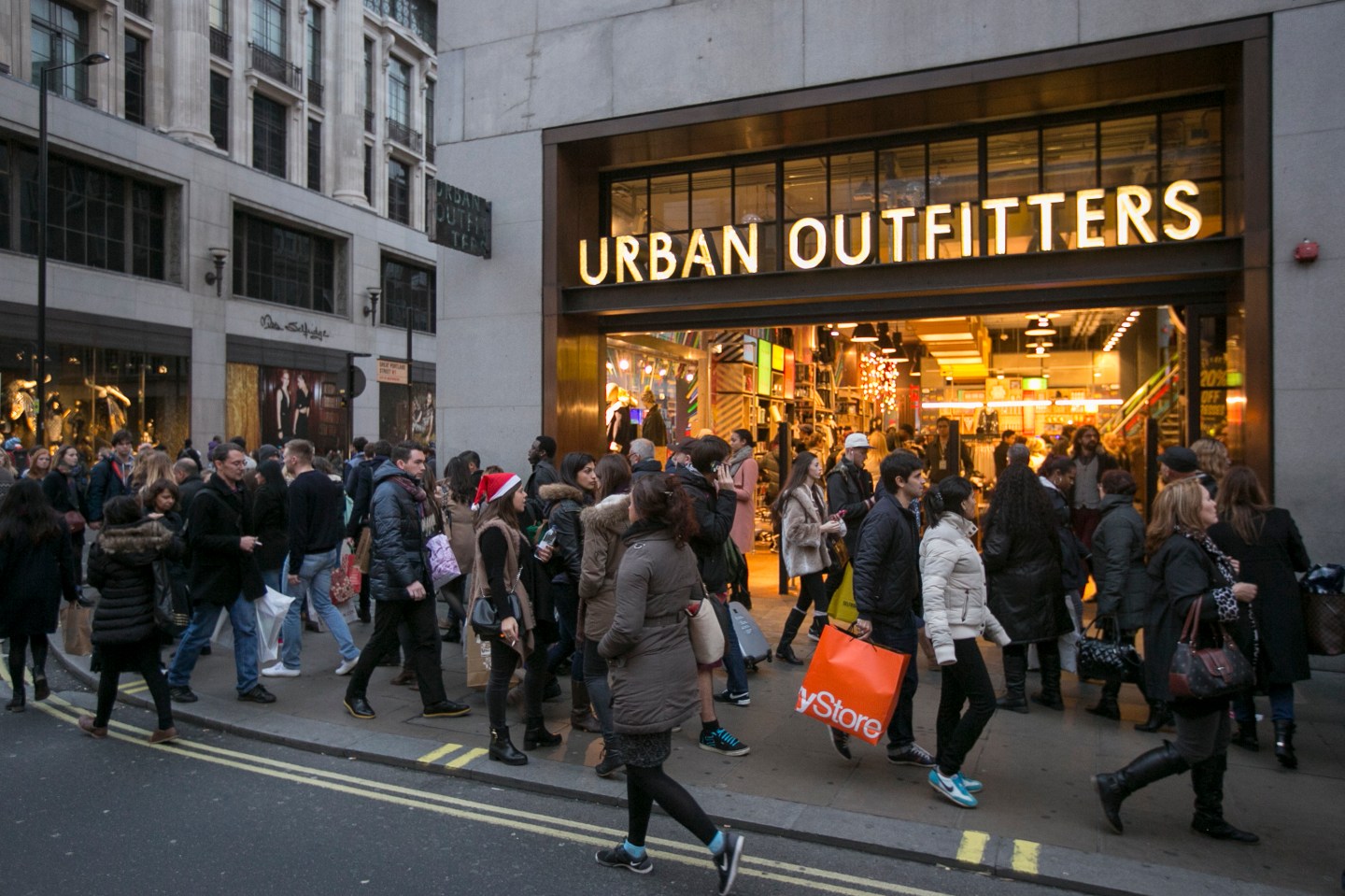 Christmas Shoppers Hunt For Gifts On The High Street