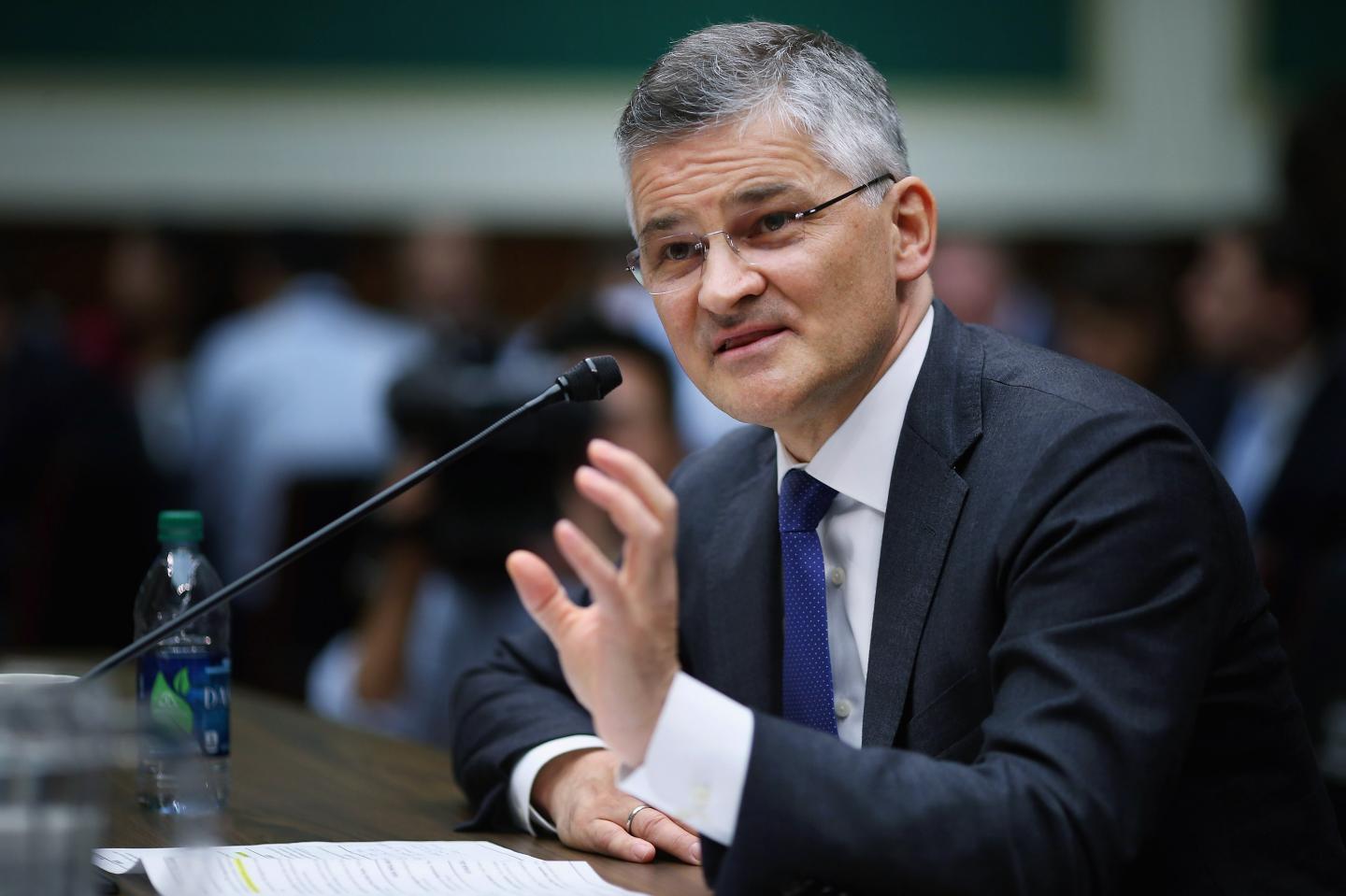 WASHINGTON, DC - OCTOBER 08:  Volkswagen Group of America President and CEO Michael Horn testifies before the House Energy and Commerce Committee's Oversight and Investigations Subcommittee in the Rayburn House Office Building on Capitol Hill October 8, 2015 in Washington, DC. Horn was questioned by members of Congress about the origins and details behind Volkswagen's emissions scandal, which the company said involved the rigging of engines in 11 million diesel cars around the world to beat emissions tests.  (Photo by Chip Somodevilla/Getty Images)