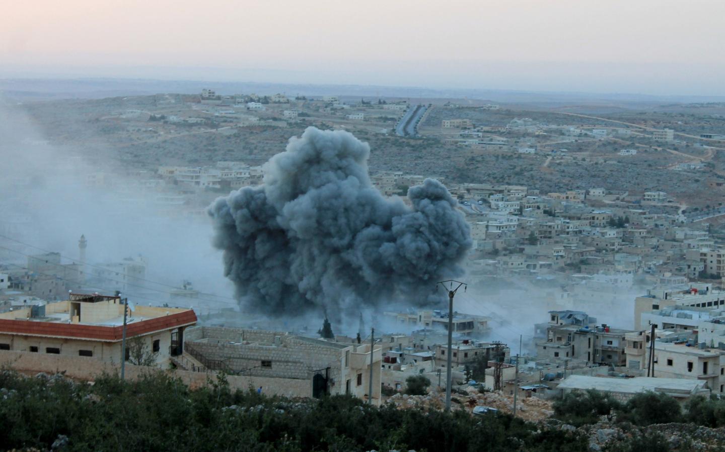 Smoke rises after Russian war crafts hit the Syrian opposition controlled town Daret Ezza in Aleppo, Syria Tuesday.