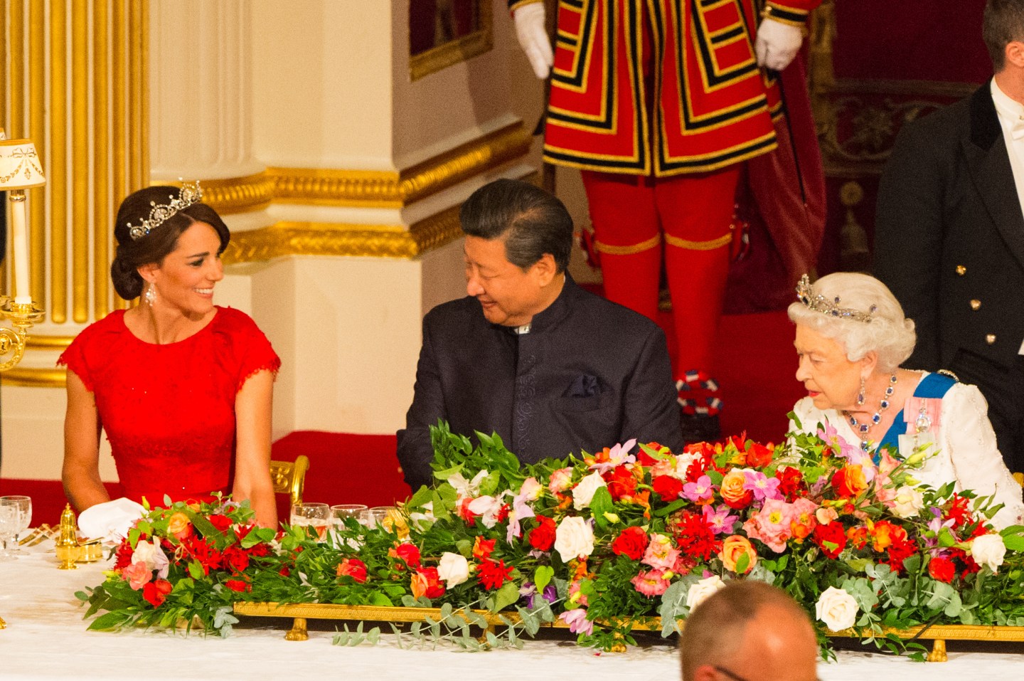 Chinese President Xi Jinping with the Duchess of Cambridge (left) and Queen Elizabeth II at a state banquet at Buckingham Palace, London, during the first day of his state visit to the UK. PRESS ASSOCIATION Photo. Picture date: Tuesday October 20, 2015. See PA story ROYAL China. Photo credit should read: Dominic Lipinski/PA Wire