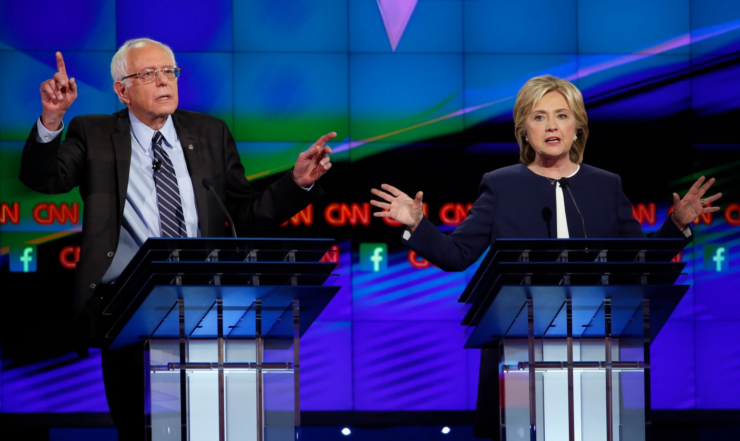 Democratic presidential candidates U.S. Senator Bernie Sanders and former Secretary of State Hillary Clinton debate during the first official Democratic candidates debate of the 2016 presidential campaign in Las Vegas