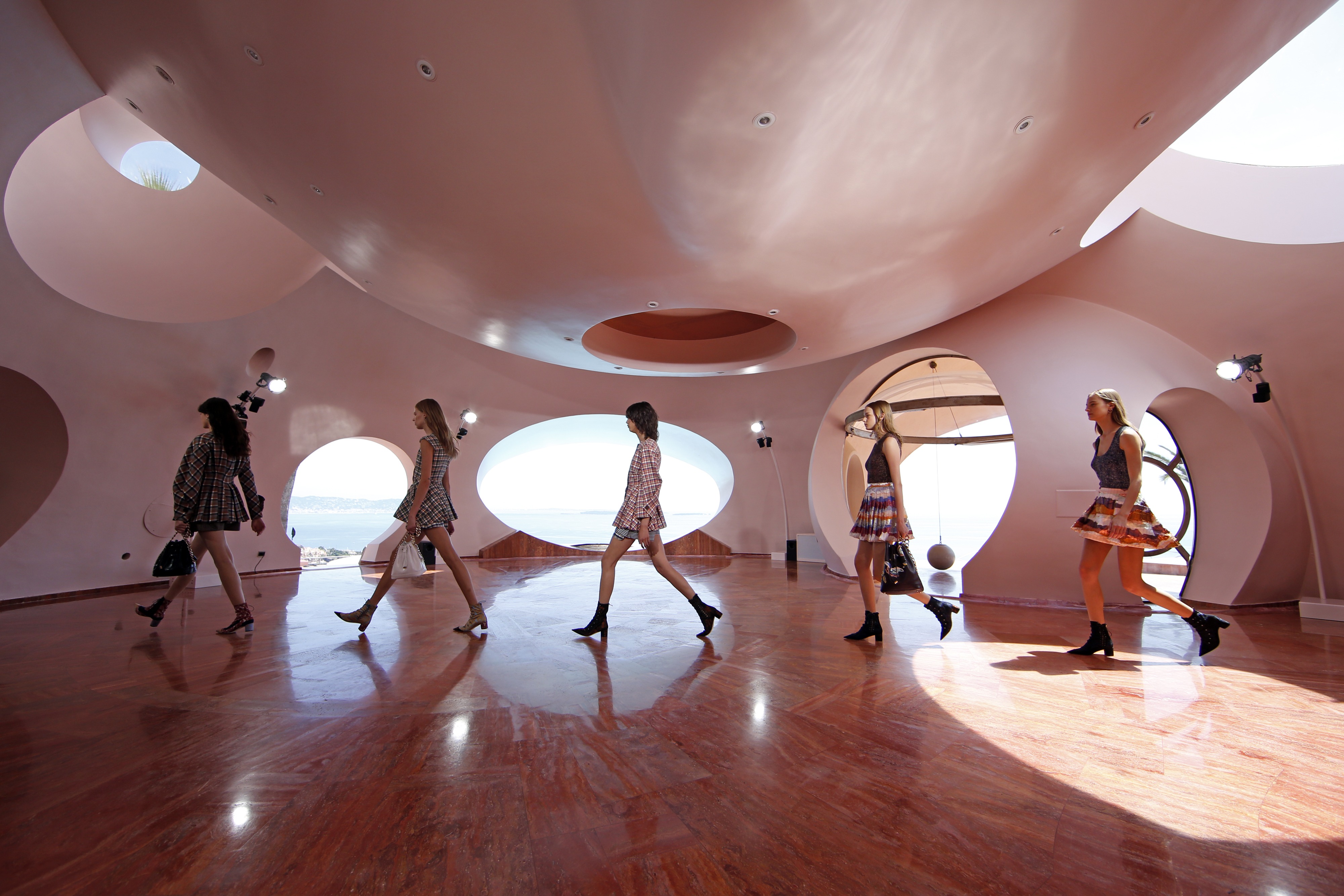 Interior dome of Palais Bulles with organic windows and curved seating