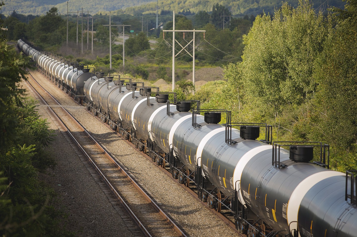 Unused oil tank cars are pictured on Western New York & Pennsylvania Railroad tracks outside Hindsdale, New York