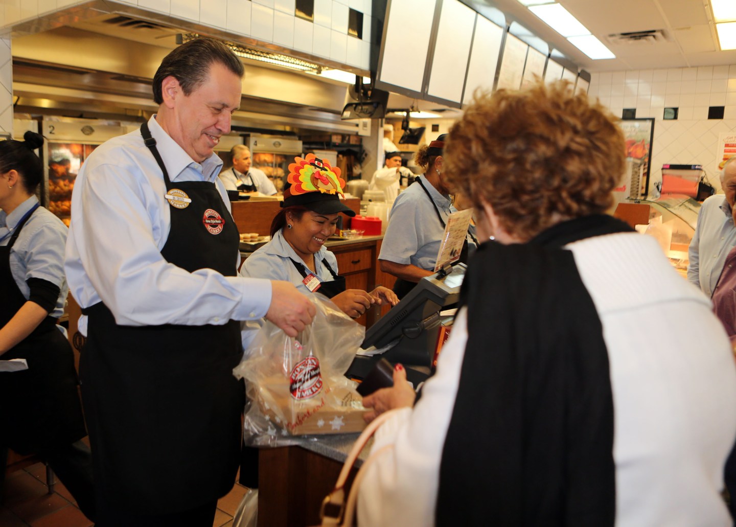Boston Market CEO George Michel Works at Miami-area restaurant o