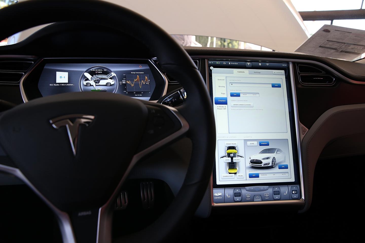 Electronic Car Maker Telsa Reports Quarterly Earnings