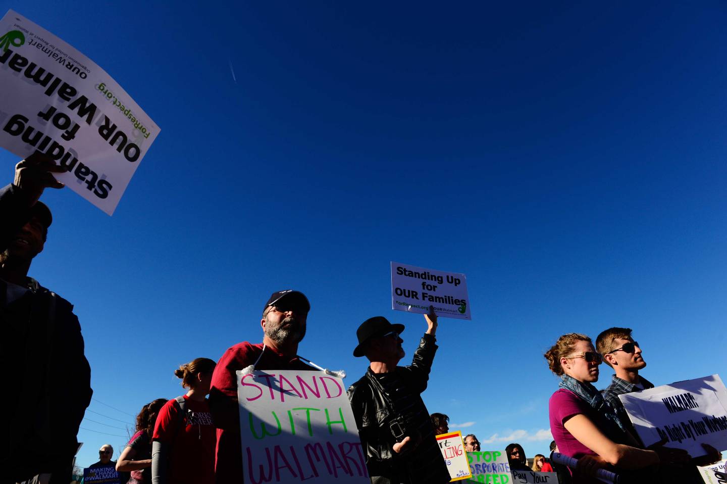 Caption:LAKESIDE, CO - NOVEMBER 29: Community and labor groups protest outside a Walmart in Lakeside on Black Friday, November 29, 2013. They were protesting the nation's largest retailer on the busiest shopping day of the year. (Photo by RJ Sangosti/The Denver Post via Getty Images)