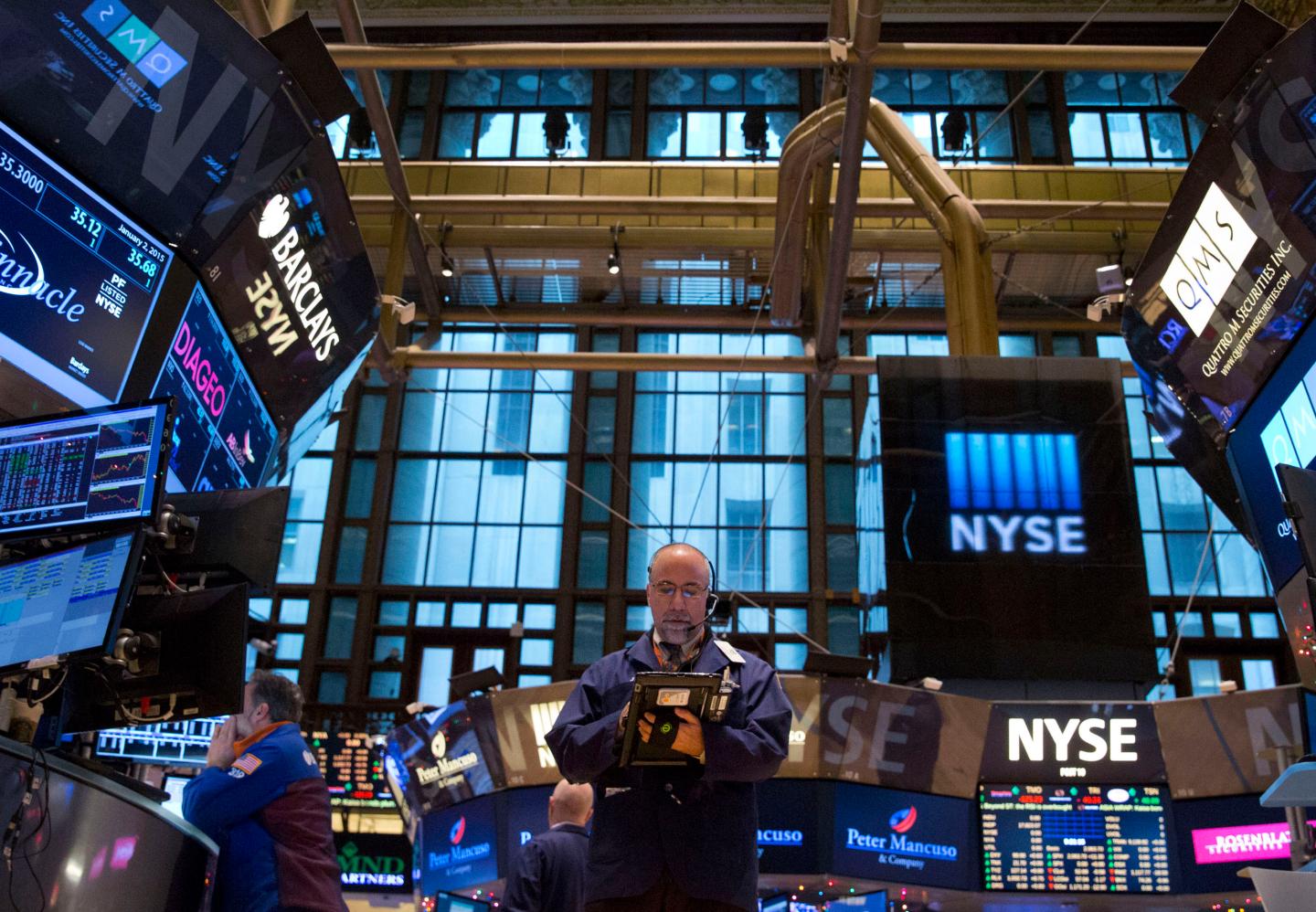 First Day Of Trading for 2015 On The Floor Of The NYSE As U.S. Stock-Index Futures Rise After S&amp;P 500's December Decline