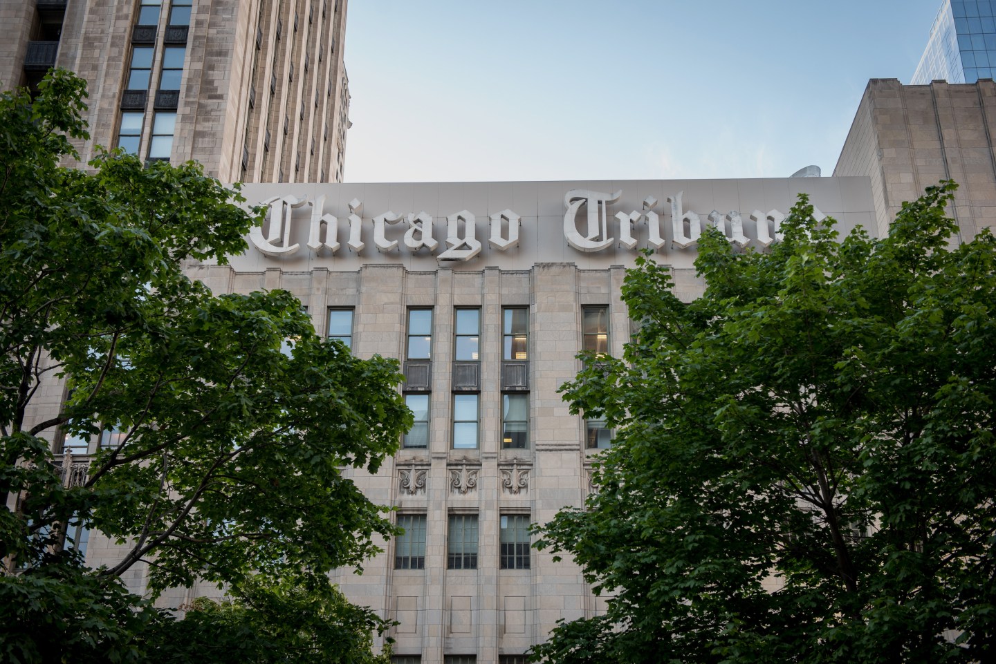 Chicago Tribune signage is displayed on the side of the Tribune Tower in Chicago, Illinois, U.S. August 6, 2015. Photo: Christopher Dilts/Bloomberg