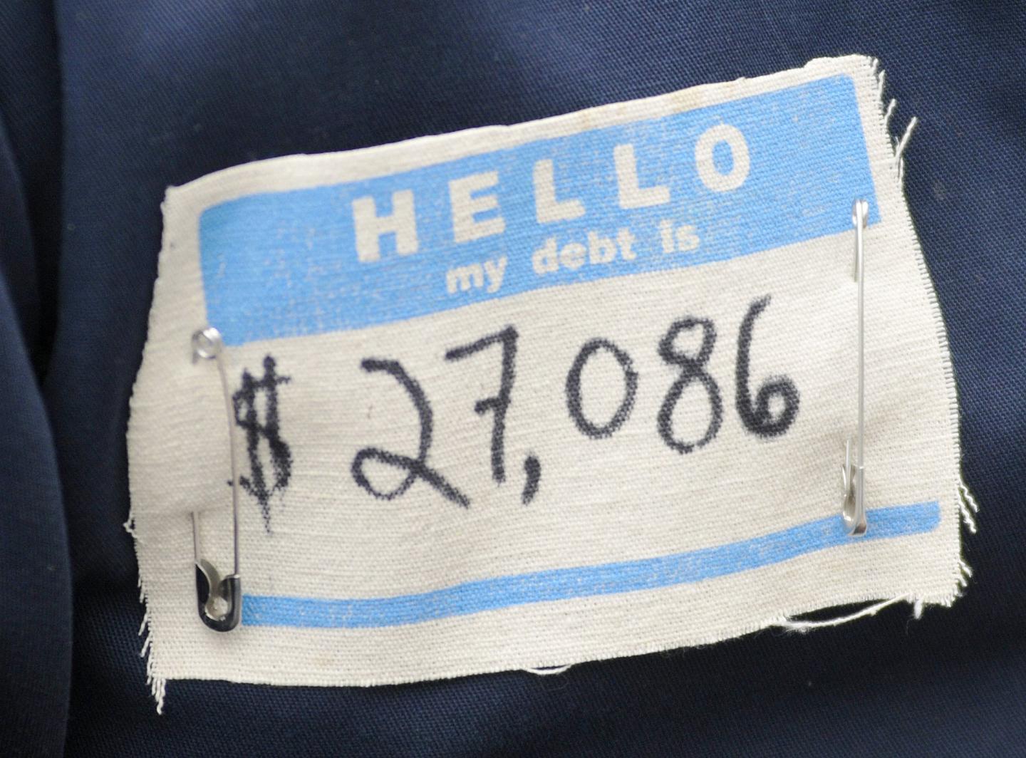 A tag worn by Jacob Lowry, a student at the University of Southern Maine as he and others protest st