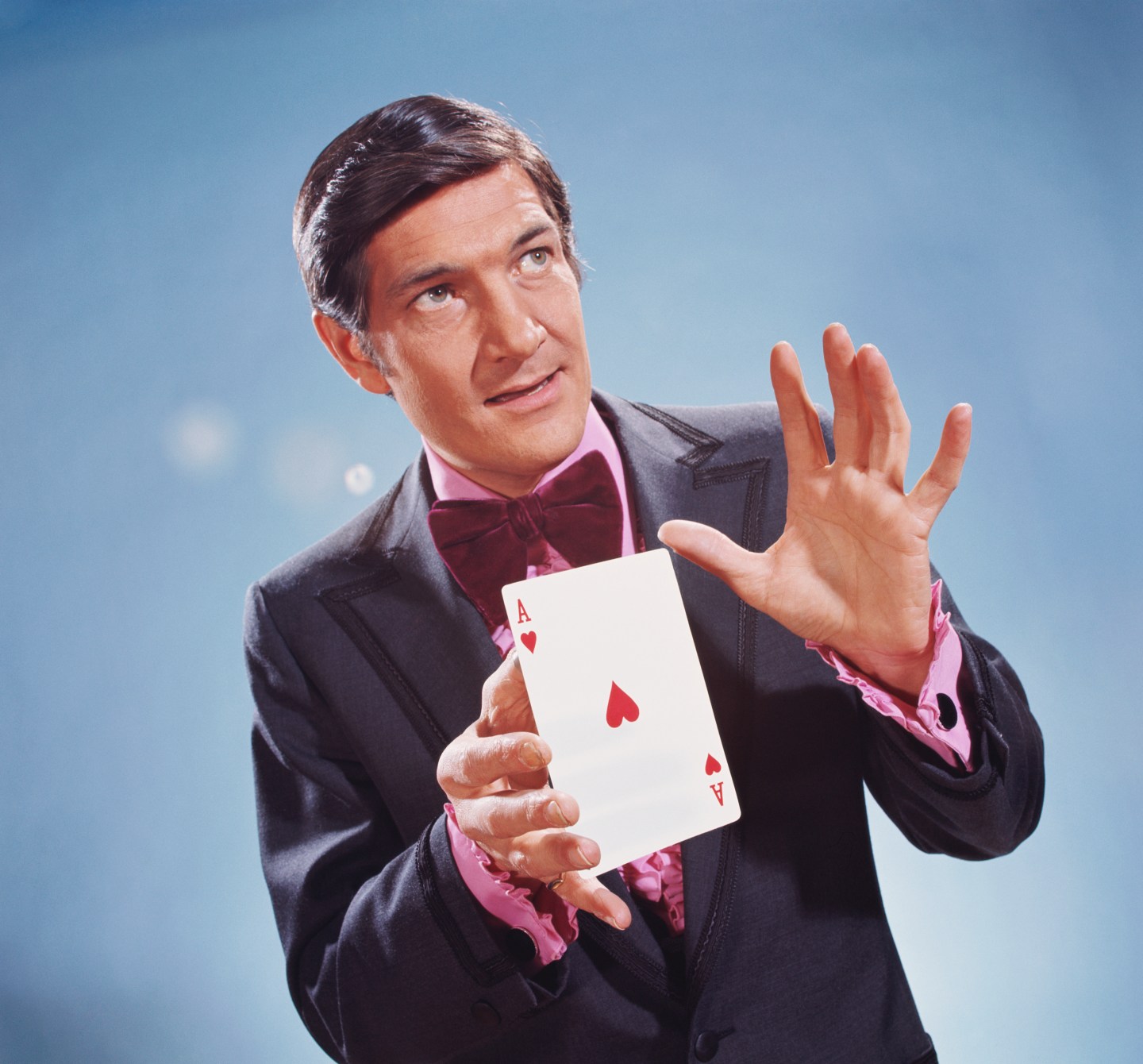 Magician performing card trick