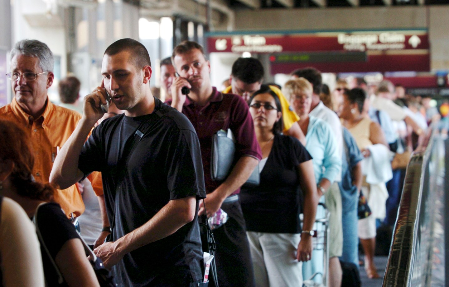Long lines of passengers queue up at the Philadelphia International Airport.