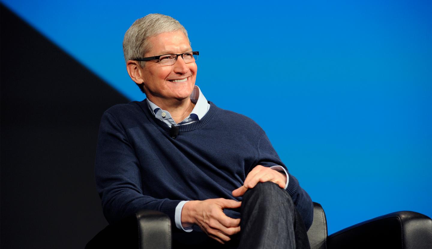 Tim Cook, chief executive officer of Apple Inc., smiles during the BoxWorks 2015 Conference at the Moscone Center in San Francisco, California, U.S., on Tuesday, Sept. 29, 2015. Wider consumer use of cloud storage may drive enterprises to be more flexible about being open to cloud-storage companies such as Box and Dropbox. Photographer: Michael Short/Bloomberg via Getty Images