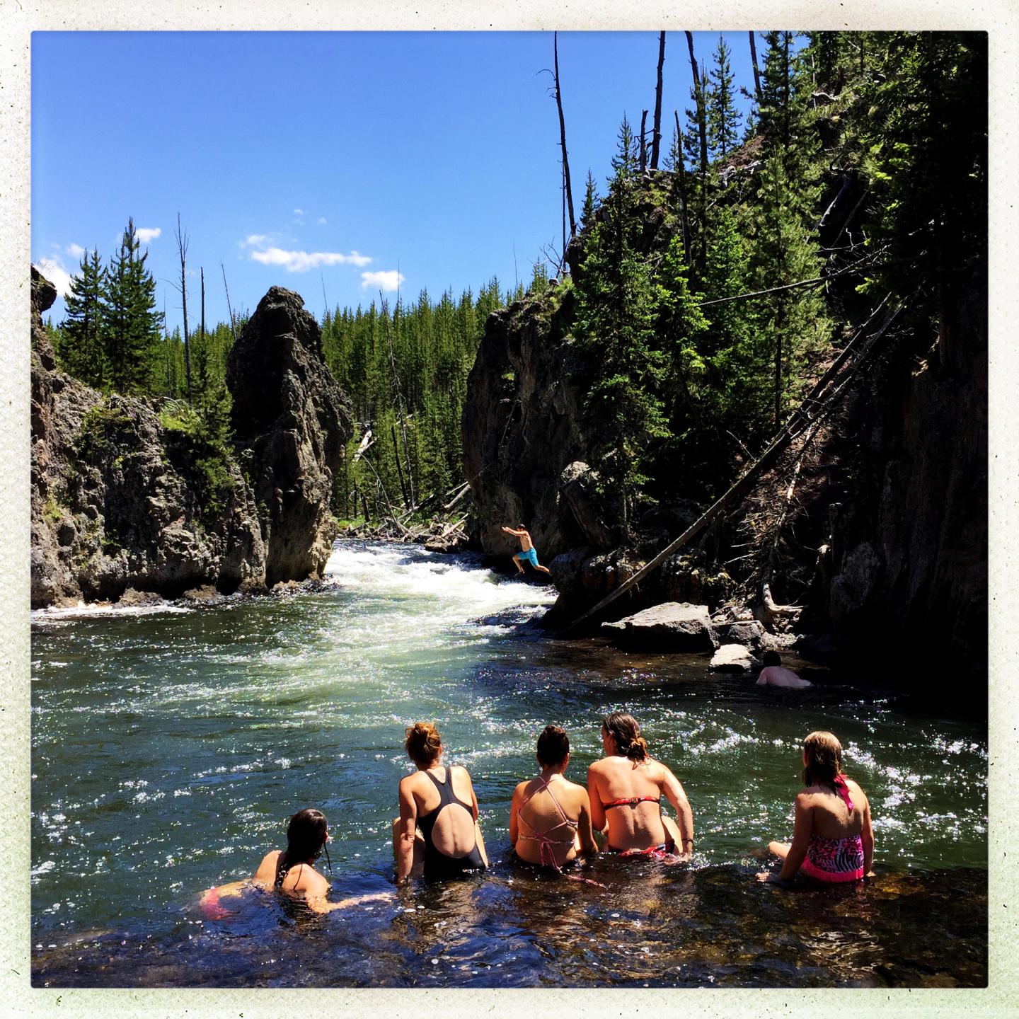 YELLOWSTONE NATIONAL PARK, WY - JUNE 19: Visitors cool off in t