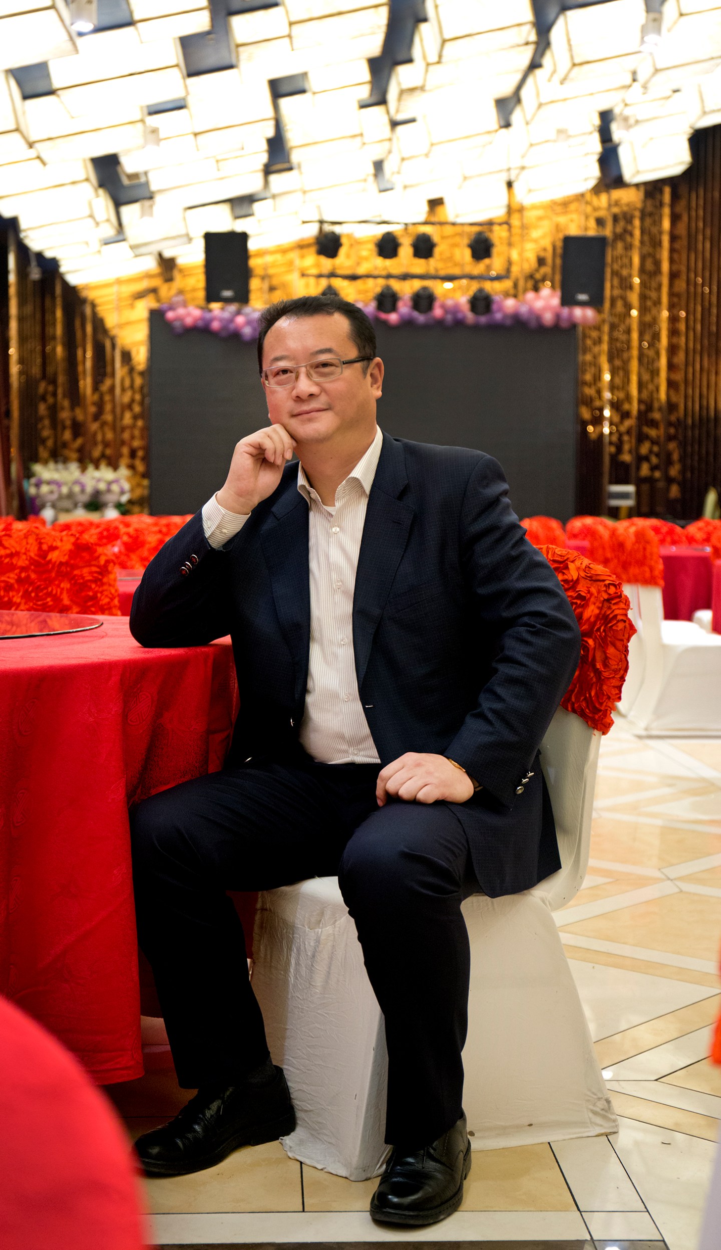 Mr. Zhang Yuhui, photographed in his restaurant in Harbin, China