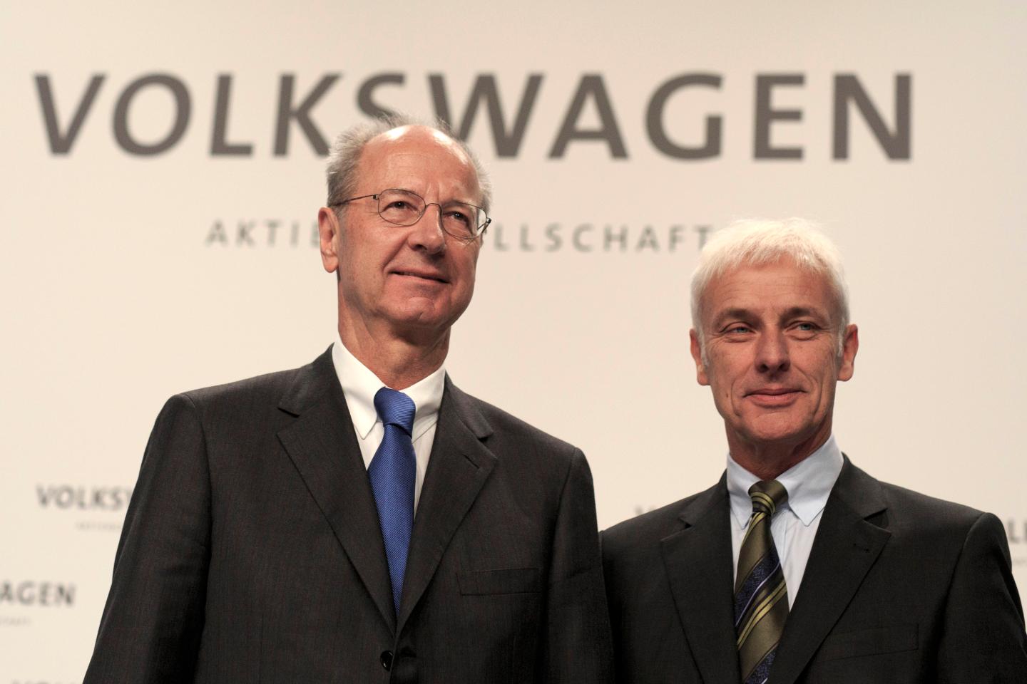 WOLFSBURG, GERMANY - DECEMBER 10:  Hans Dieter Poetsch (L), Chairman of the Supervisory Board of Volkswagen AG, and  Volkswagen Group Chairman Matthias Mueller (R), arrive to the press conference to announce the latest update in the company's handling of the engine emissions scandal on December 10, 2015 in Wolfsburg, Germany. Volkswagen is continuing to grapple with the consequences after it admitted installing software that cheats during emissions tests into 11 million of its diesel cars sold worldwide.  (Photo by Carsten Koall/Getty Images)