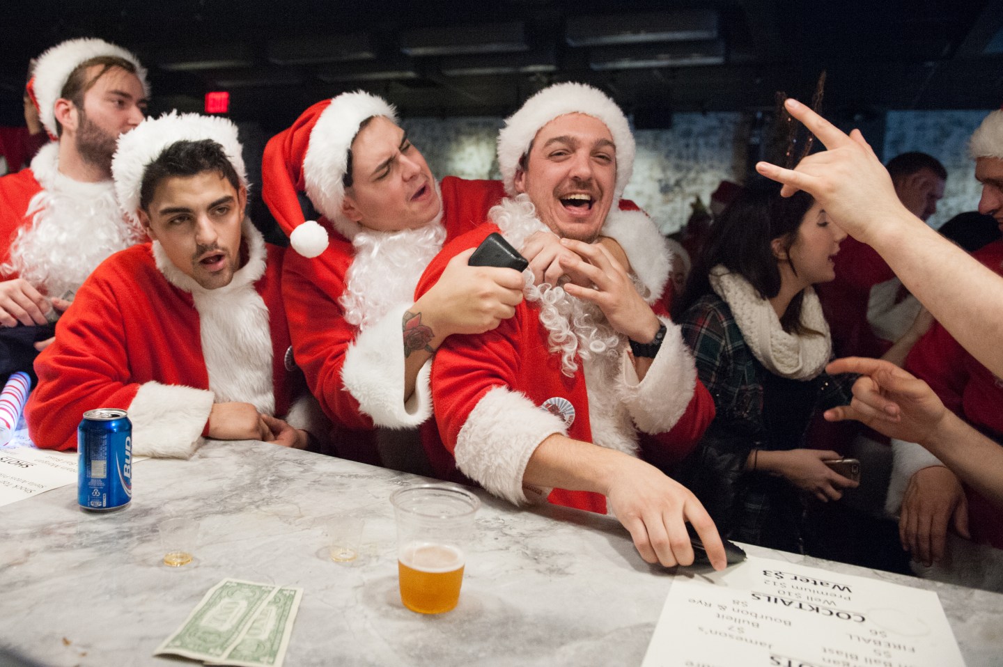 Annual SantaCon Pub Crawl Held In New York City