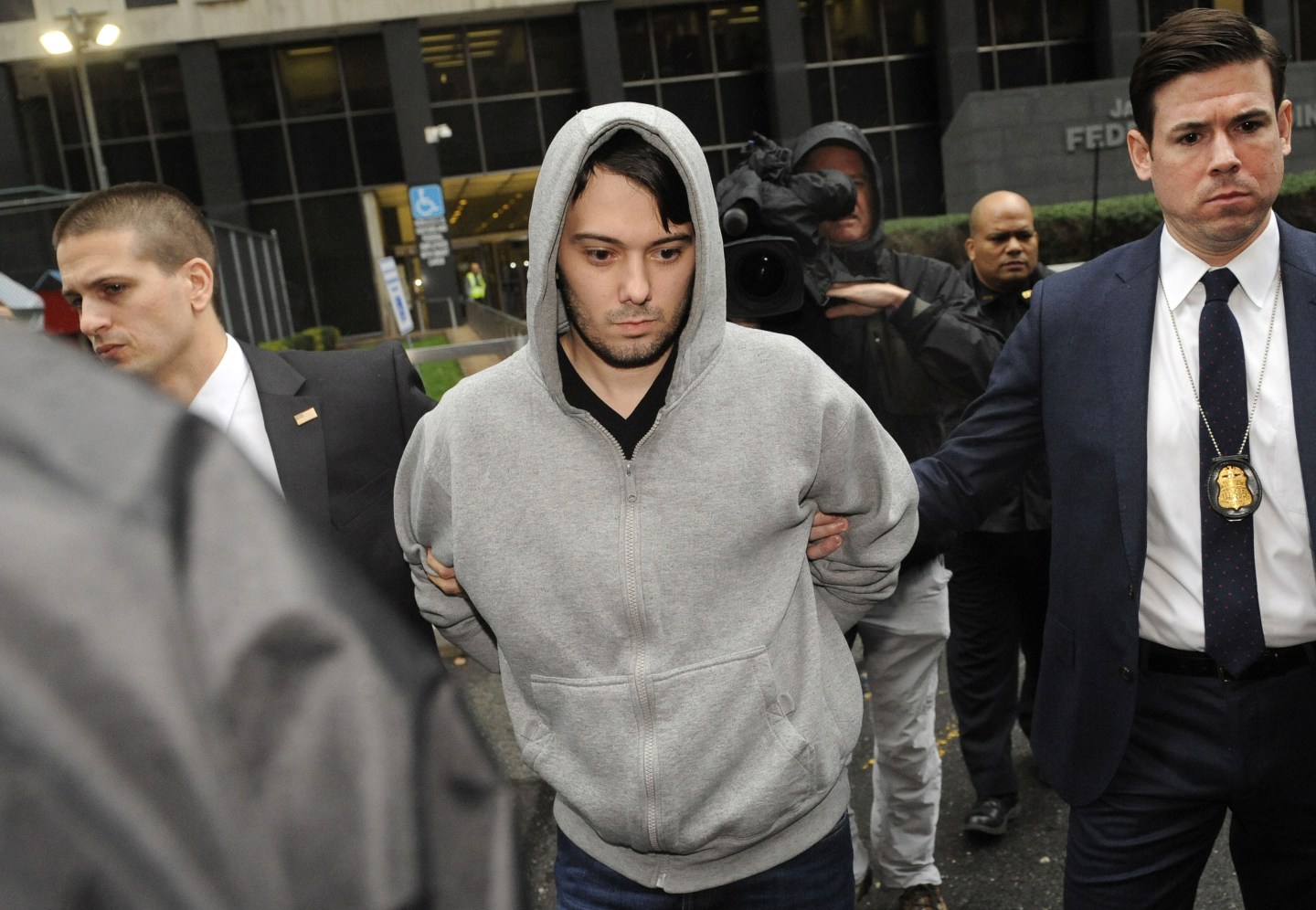 Martin Shkreli, CEO Reviled for Drug Price Gouging, Arrested on Securities Fraud Charges