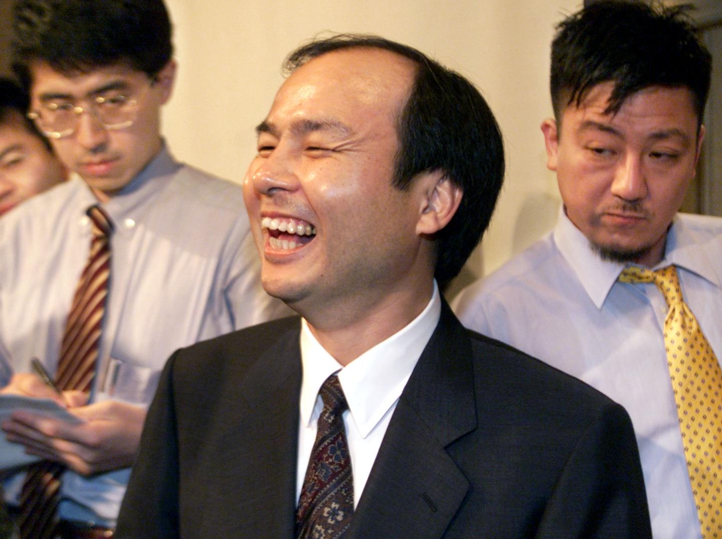 Masayoshi Son (C), president of Japan's major Inte
